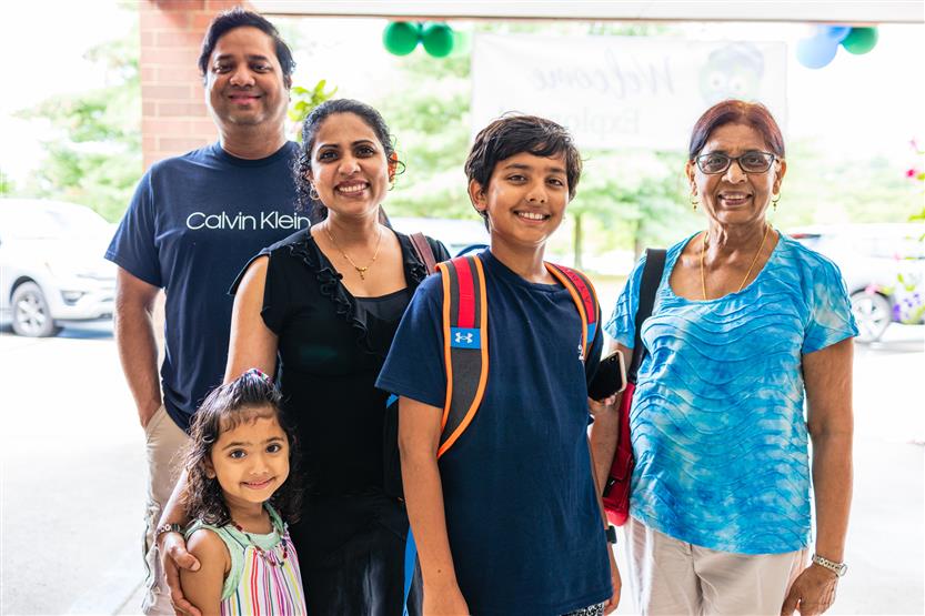 A family takes a photo